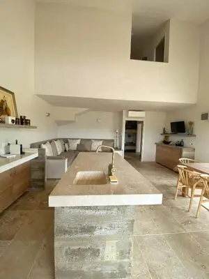 a kitchen with a sink and a counter top at A Casa di Santa Giulia in Porto-Vecchio