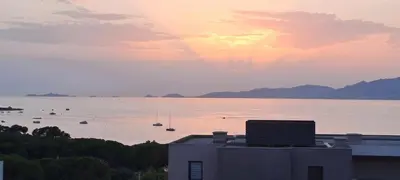 a view of a large body of water with boats at Les Rivages De Stagnola - Vue Mer et Plages à Pied in Pietrosella