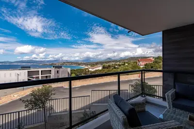 a balcony with a view of the ocean at Les Rivages De Stagnola - Vue Mer et Plages à Pied in Pietrosella