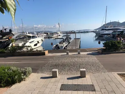 a group of boats docked in a marina at Palombaggia in Porto-Vecchio