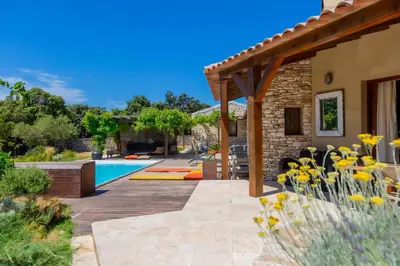 a backyard with a swimming pool and a house at Villa SoleLuna chambre Jeanne in Bonifacio