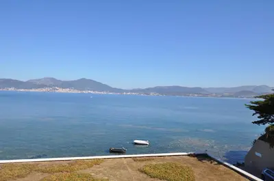 a view of a large body of water at Un balcon sur la mer - Duplex 60 m2 - Chambres à l'étage - Pieds dans l'eau - Accès plage sans route à traverser in Porticcio
