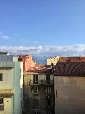 a view of roofs of buildings in a city at Chez Andrea, Centre Historique Ajaccio in Ajaccio