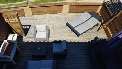 an overhead view of a patio with chairs and tables at Appartement Cemiliana in Bonifacio