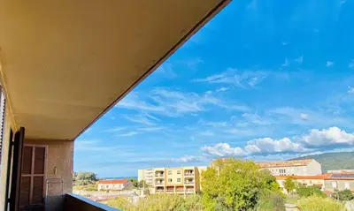 a view from the balcony of a building at Joli deux pièces, centre ville et proche plage in Propriano