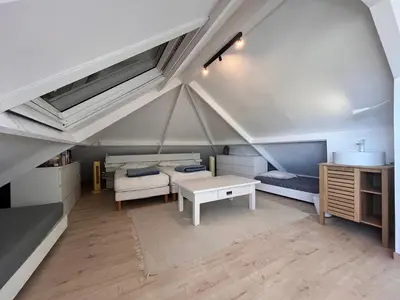 a room with a tent with two beds and a table at VILLA GIOIA -Vue mer- proche plage de Favone in Conca