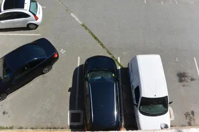 an aerial view of two cars parked in a parking lot at DOLCE VITA in Kamiesch