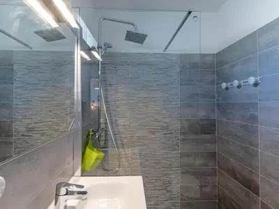 a bathroom with a sink and a shower at Holiday Home Signoria by Interhome in Sari Solenzara