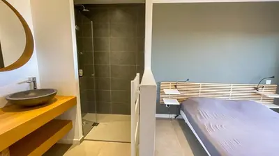 a bathroom with a sink and a shower at Villa Caramontinu in Sainte-Lucie de Porto-Vecchio