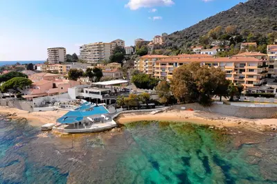 an aerial view of a resort and a beach at Appartement refait à neuf, proche plage et centre ville- Ajaccio-Parc Berthaut in Ajaccio