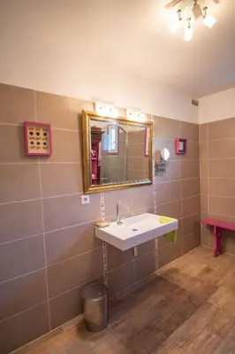 a bathroom with a sink and a mirror at U Paradisu - Villa 10/12 pers avec piscine privée in Alata