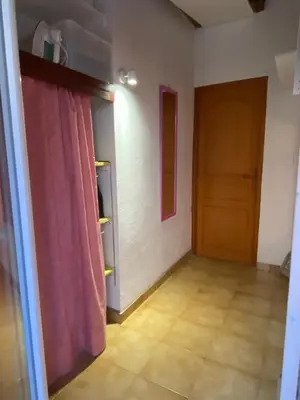 an empty room with a door and a room with a floor at Casa Lova in Propriano