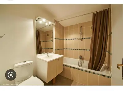a bathroom with a toilet and a sink and a tub at Maison Le Prunier avec piscine - Domaine E Case Di Cuttoli in Cuttoli-Corticchiato