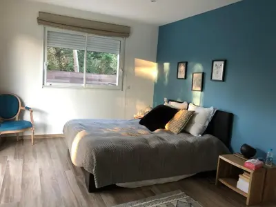 a bedroom with a large bed and a window at Chambre à Louer sur bonifacio in Bonifacio