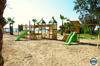 a playground on the beach with a slide at apartment on the sea - Moriani beach in San-Nicolao