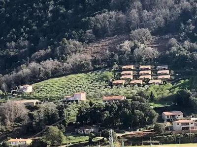 an aerial view of a village on a hill at Strada di a cuma in Vico