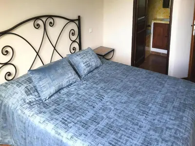 a bar in a hotel room with chairs at Res Mare e Monte, Solenzara, Bungalow with terrace in Favone