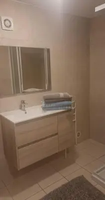 a bathroom with a sink and a mirror at corse in Appietto