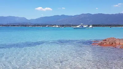 a large body of water with boats in the water at Apartment Porto Vecchio, 6 persons, 500 m beach in Zonza