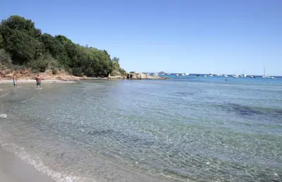 a couple of people walking on the beach at Apartment Porto Vecchio, 6 persons, 500 m beach in Zonza