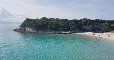 an aerial view of a beach with people in the water at Apartment Porto Vecchio, 6 persons, 500 m beach in Zonza