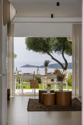 a living room with a view of the ocean at Résidence Omigna in Cargèse