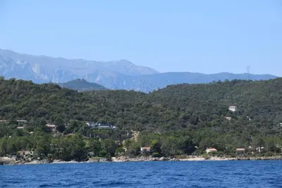 a small island in the middle of a body of water at Superbe Villa, incroyable vue mer, avec piscine privative à Solenzara in Togna