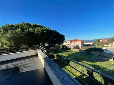 a view from the balcony of a house at APPART-SPACIEUX-VUE MER-4 PERS in Propriano