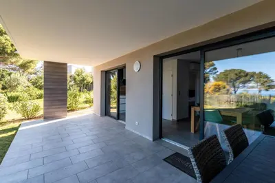 an external view of a house with a patio at L'eclat de Stagnola in Pietrosella