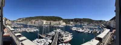 a bunch of boats docked in a harbor at Appartements Bonifacio AcquaViva in Bonifacio