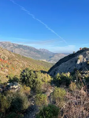 a view from the top of a mountain at Joli T2 dans villa in Corte