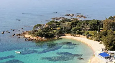 an aerial view of a small island in the ocean at Destinu Marinella in Ajaccio