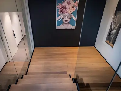 a staircase in a room with a glass floor at Porto-Vecchio Palombaggia Villa Azaïtù in Porto-Vecchio