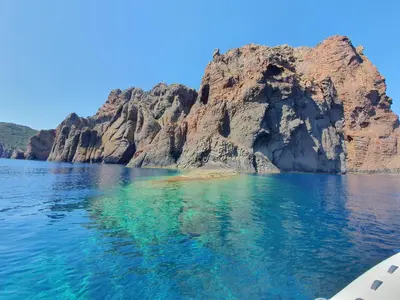 a view of a rocky island in the water at Villa l'alivu in Afa