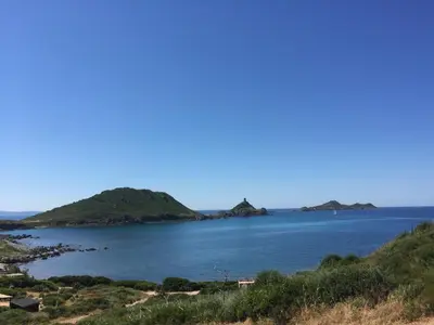 a view of a large body of water with islands at Ajaccio magnifique T2 40m2 centre ville vue mer au bord de la plage neuf 5 personnes Clim wifi balcon parking privé fermé in Ajaccio