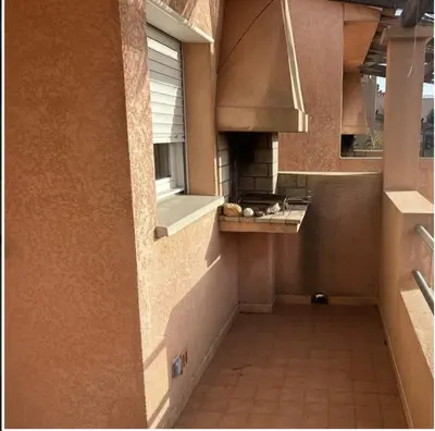 a kitchen with a stove and a counter in a building at Residence Conca Blue in Conca