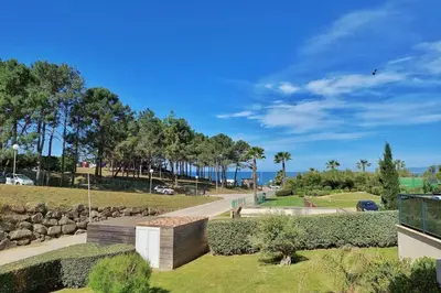 a view of the beach from a house at Stella - Agosta beach by foot Terrace - by TGB in Porticcio