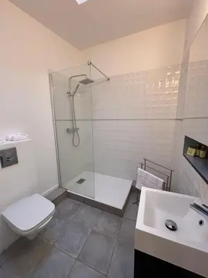 a bathroom with a shower and a toilet and a sink at Appartement T2 Vieux Port d'Ajaccio in Ajaccio