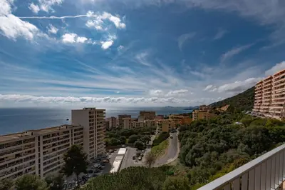 a view of a city and the ocean at Ajaccio, Sanguinaires, Hélios, vue mer magnifique, T2 4pers in Ajaccio