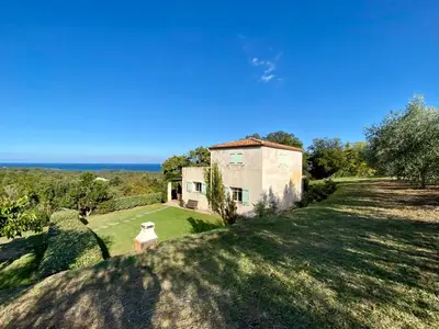 an old house on a hill with a grass field at Domaine Punta della Guardia villa vue mer dans nature protégée, plage à 1,5 km in Cervione