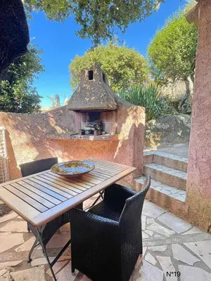 a view of a house from the garden at Résidence Storia di Blue in Porto-Vecchio