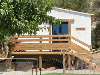 a house with a net in front of it at Casa Santa Giulia in Propriano