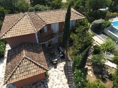 an aerial view of a house with a swimming pool at Casa Mathilde in Lecci