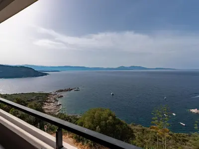 a view of a body of water from a balcony at Apartment La Spelunca by Interhome in Cargèse