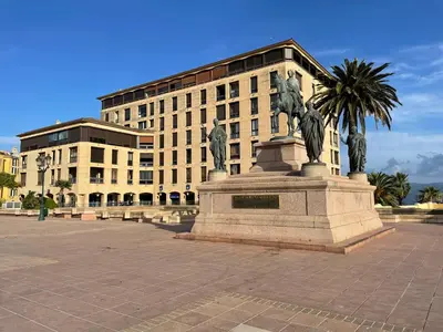 a statue in a plaza in front of a building at Ajaccio : appartement centre historique in Ajaccio