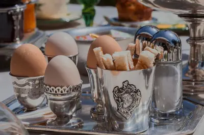 a group of eggs and french fries in metal containers at Casa del Sole Chambres d'Hotes de Charme in Favone