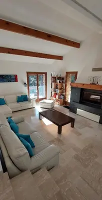a living room with a couch and a table at DOMAINE CARDU in Cardo-Torgia