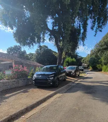 two cars parked on the side of a street at DOMAINE CARDU in Cardo-Torgia