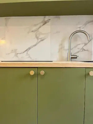 a kitchen counter with a sink and a counter top at studio d'architecte superieur - centre ville historique in Ajaccio