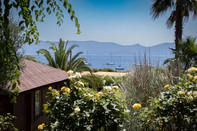 a house with a view of the ocean at Mare E Monti in Porto Pollo